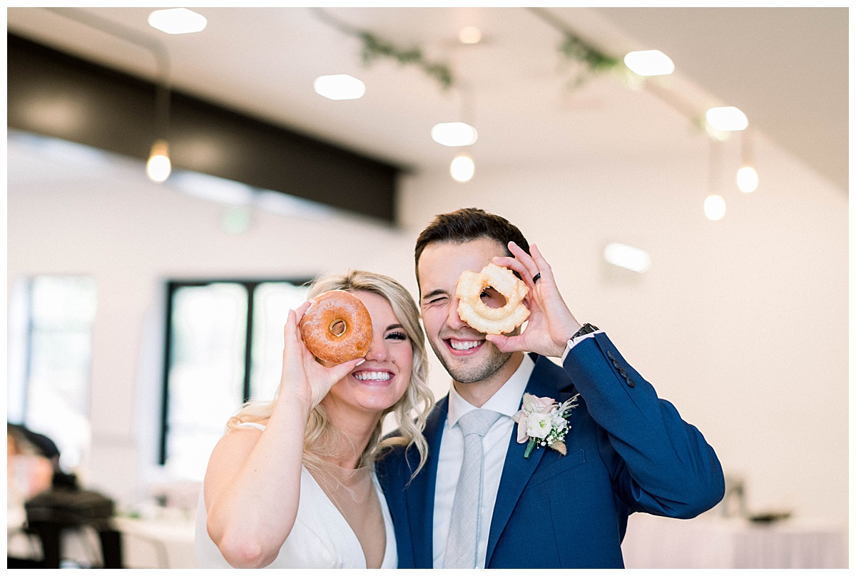 Pinewood wedding couple with donuts